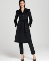 In a belted silhouette, Armani's cinched-waist coat lends a polished look in the warmest wool.