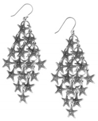 Wear beach attire anywhere you go with these marine-inspired Lucky Brand starfish chandelier earrings.    A cluster of starfish set in silver tone mixed base metal and black enamel. Approximate drop: 3-1/4 inches.