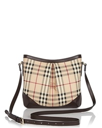 Go preppy chic with this checked crossbody bag from Burberry. Go preppy chic with this checked crossbody bag from Burberry.