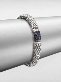 From the Muse Collection. An iconic caviar texture in sleek sterling silver accented with a rich blue sapphire station. Sterling silverBlue sapphireLength, about 7.5Box and tongue closureImported 