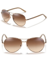 Exude classic cool in these aviator-style shades from Burberry. Exude classic cool in these aviator-style shades from Burberry.