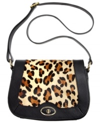 Get exotically inspired with this this irresistible crossbody from Giani Bernini. Butter-soft leather is accented with leopard print haircalf and signature hardware, while the well-organized interior stows your essentials with ease. Get exotically inspired with this this irresistible crossbody from Giani Bernini. Butter-soft leather is accented with leopard print haircalf and signature hardware, while the well-organized interior stows your essentials with ease.