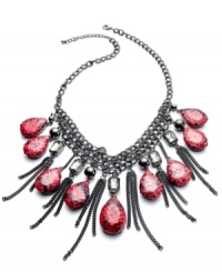 Take a walk on the wild side. Style&co.'s fierce statement necklace bites back with plastic beads with snakeskin vinyl and smoky metal fringe. Crafted in hematite tone mixed metal. Approximate length: 18 inches + 2-inch extender. Approximate drop: 7 inches. Take a walk on the wild side. Style&co.'s fierce statement necklace bites back with plastic beads with snakeskin vinyl and smoky metal fringe. Crafted in hematite tone mixed metal. Approximate length: 18 inches + 2-inch extender. Approximate drop: 7 inches.