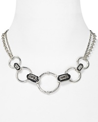 Give into glamour with this T Tahari link necklace, which features a gorgeous link chain, styled with glittering crystal accents. Give into glamour with this T Tahari link necklace, which features a gorgeous link chain, styled with glittering crystal accents.