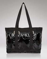 This shiny, durable patent nylon tote is roomy enough for chic weekend travel--and then some. By LeSportsac. This shiny, durable patent nylon tote is roomy enough for chic weekend travel--and then some. By LeSportsac.