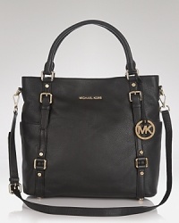 Stay one step ahead of the in-crowd with this leather tote from MICHAEL Michael Kors. Ideal for days on the go, it's the perfect fusion or form, fashion and function. Stay one step ahead of the in-crowd with this leather tote from MICHAEL Michael Kors. Ideal for days on the go, it's the perfect fusion or form, fashion and function.