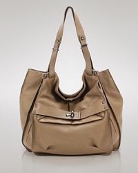 Adopt a free spirited approach to accessorizing with this vintage-inspired hobo from Kooba. In ultra-soft leather and a slouchy shape, it lends daytime looks a distinctive, bohemian vibe. Adopt a free spirited approach to accessorizing with this vintage-inspired hobo from Kooba. In ultra-soft leather and a slouchy shape, it lends daytime looks a distinctive, bohemian vibe.