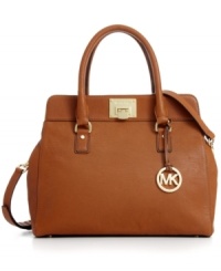 Poised and practical, this ladylike silhouette from MICHAEL Michael Kors offers a touch of elegance to any ensemble. Luxurious leather is exquisitely adorned with gleaming custom hardware, while pockets inside and out provide intuitive organization. Poised and practical, this ladylike silhouette from MICHAEL Michael Kors offers a touch of elegance to any ensemble. Luxurious leather is exquisitely adorned with gleaming custom hardware, while pockets inside and out provide intuitive organization.
