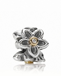 A sterling silver daisy chain charm from PANDORA with 14K gold bezel-set diamond centers. A sterling silver daisy chain charm from PANDORA with 14K gold bezel-set diamond centers.