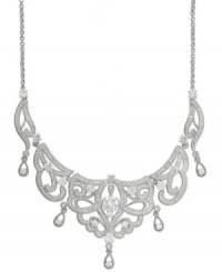 Formal flair. The Grandeur frontal necklace from Eliot Danori dazzles at any affair. Crafted from rhodium-plated brass, the necklace truly glistens with crystals and cubic zirconias (6 ct. t.w.). Approximate length: 16 inches + 2-inch extender. Formal flair. The Grandeur frontal necklace from Eliot Danori dazzles at any affair. Crafted from rhodium-plated brass, the necklace truly glistens with crystals and cubic zirconias (6 ct. t.w.). Approximate length: 16 inches + 2-inch extender.