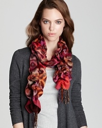 For bohemian-inspired style, throw on Aqua's ruched scarf with a beautifully bright ikat print and fringe edges. For bohemian-inspired style, throw on Aqua's ruched scarf with a beautifully bright ikat print and fringe edges.