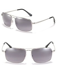 All-season Tom Ford aviator sunglasses re-envision the classic frame in a sleeker, more chiseled design. All-season Tom Ford aviator sunglasses re-envision the classic frame in a sleeker, more chiseled design.