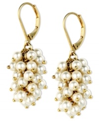 Shake things up! Anne Klein's drop earrings feature plastic pearls in chic clusters. Crafted in gold tone mixed metal with leverback closure. Shake things up! Anne Klein's drop earrings feature plastic pearls in chic clusters. Crafted in gold tone mixed metal with leverback closure.