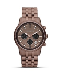 Tap into this season's espresso toned watch trend with this sporty style from MICHAEL Michael Kors. Contemporary and sleek, it's a modern man's alternative to metalics. Tap into this season's espresso toned watch trend with this sporty style from MICHAEL Michael Kors. Contemporary and sleek, it's a modern man's alternative to metalics.