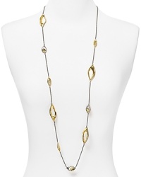 A bit vintage glamor, a bit statement piece, this gold-plated Alexis Bittar necklace styles your look Art Deco with crystal-detailed stations. A bit vintage glamor, a bit statement piece, this gold-plated Alexis Bittar necklace styles your look Art Deco with crystal-detailed stations.