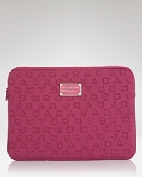 Ensure your computer is pretty (and protected) with this neoprene laptop case from MARC BY MARC JACOBS. Ensure your computer is pretty (and protected) with this neoprene laptop case from MARC BY MARC JACOBS.