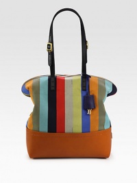 Roomy zip-top bag crafted from vibrant canvas and rich leather trim.Adjustable leather shoulder straps,8¾-10¼ dropTop zip closureCenter zip compartmentTwo inside open pocketsLinen lining11W X 13H X 5¼DMade in Italy Roomy zip-top bag crafted from vibrant canvas and rich leather trim.Adjustable leather shoulder straps,8¾-10¼ dropTop zip closureCenter zip compartmentTwo inside open pocketsLinen lining11W X 13H X 5¼DMade in Italy
