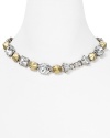 MARC BY MARC JACOBS refines the big bag theory with this rock-chic necklace, cast in plated brass and accented with crystal bow stations.