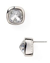 Combining a neutral color palette with faceted sparkle, this pair of crystal stud earrings from T Tahari will lend every look instant glamor. Combining a neutral color palette with faceted sparkle, this pair of crystal stud earrings from T Tahari will lend every look instant glamor.