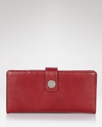 A classic bifold continental wallet in luxe leather from Hobo. A classic bifold continental wallet in luxe leather from Hobo.