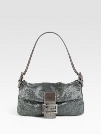 A fully beaded style with a beautiful shimmer and metallic leather trim.Adjustable shoulder strap, 4½-7½ dropMagnetic snap flap closureOne inside zip pocketFully lined10½W X 6H X 1¾DMade in Italy A fully beaded style with a beautiful shimmer and metallic leather trim.Adjustable shoulder strap, 4½-7½ dropMagnetic snap flap closureOne inside zip pocketFully lined10½W X 6H X 1¾DMade in Italy
