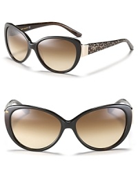 Turn heads in cat eye sunglasses with wild animal print arms and gradient lenses. Turn heads in cat eye sunglasses with wild animal print arms and gradient lenses.