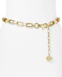 Jazz up every look without breaking a sweat with this chain belt from Tory Burch, accented by a delicate logo charm and gleaming metallic links. Jazz up every look without breaking a sweat with this chain belt from Tory Burch, accented by a delicate logo charm and gleaming metallic links.
