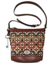 Simple and seriously chic, this cool crossbody from Fossil reels in old school charm with a contemporary attitude. Mod tapestry, leather trim and signature hardware add depth and dimension, while the spacious interior stashes your everyday essentials with ease. Simple and seriously chic, this cool crossbody from Fossil reels in old school charm with a contemporary attitude. Mod tapestry, leather trim and signature hardware add depth and dimension, while the spacious interior stashes your everyday essentials with ease.