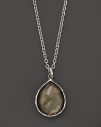 Sterling silver frames a faceted, teardrop shaped pyrite doublet on this timeless Ippolita pendant necklace. Sterling silver frames a faceted, teardrop shaped pyrite doublet on this timeless Ippolita pendant necklace.
