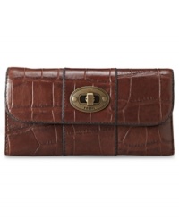 Add some exotic appeal to your accessories arsenal with this croc-embossed leather clutch from Fossil. Accented with vintage-inspired hardware and detail stitching, it boasts a pocket-lined interior to keep you organized anywhere. Add some exotic appeal to your accessories arsenal with this croc-embossed leather clutch from Fossil. Accented with vintage-inspired hardware and detail stitching, it boasts a pocket-lined interior to keep you organized anywhere.