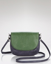 Join the color block party with this leather crossbody from DKNY. Ideally sized for the essentials, this tone on tone mini bag makes a major statement. Join the color block party with this leather crossbody from DKNY. Ideally sized for the essentials, this tone on tone mini bag makes a major statement.