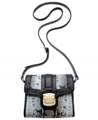 Add some edge to your frilly summer frocks with this sleek snakeskin print design from Calvin Klein. A signature golden closure lends a subtle posh feel, while the convenient crossbody strap keeps hands free for holding a frozen cocktail at that fabulous rooftop party. Add some edge to your frilly summer frocks with this sleek snakeskin print design from Calvin Klein. A signature golden closure lends a subtle posh feel, while the convenient crossbody strap keeps hands free for holding a frozen cocktail at that fabulous rooftop party.
