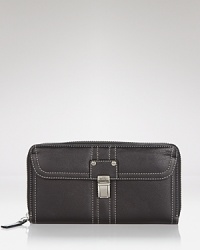 With plenty of slots for cards and cash Milly's pebble leather wallet is just the right reserve for your riches. Added bonus: the chic design works in a pinch as cute clutch after dark. With plenty of slots for cards and cash Milly's pebble leather wallet is just the right reserve for your riches. Added bonus: the chic design works in a pinch as cute clutch after dark.