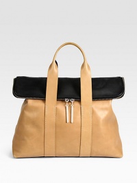 Gorgeous colorblocked leather in a slouchy top-handle carryall.Double top handles, 4 dropFlap and top-zip closureOne inside zip pocket16¼W X 12½H X 6¾DImported Please note: Front flap is versatile therefore it can be folded over on either colorblocked side. Gorgeous colorblocked leather in a slouchy top-handle carryall.Double top handles, 4 dropFlap and top-zip closureOne inside zip pocket16¼W X 12½H X 6¾DImported Please note: Front flap is versatile therefore it can be folded over on either colorblocked side.