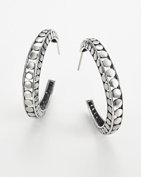 From the Dot collection, silver hoop earrings, designed by John Hardy. From the Dot collection, silver hoop earrings, designed by John Hardy.