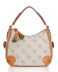 Traditional look, updated details: Dooney & Bourke's classic signature purse goes modern with architectural details like slit pleats and a rounded silhouette. Traditional look, updated details: Dooney & Bourke's classic signature purse goes modern with architectural details like slit pleats and a rounded silhouette.