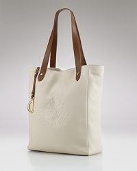Make a definitive daytime statement with this leather tote from Lauren Ralph Lauren. It's roomy enough for the essentials and chic enough for whatever your day demands. Make a definitive daytime statement with this leather tote from Lauren Ralph Lauren. It's roomy enough for the essentials and chic enough for whatever your day demands.