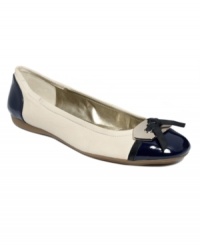 Unpredictable and irresistible. The Woundup flats by Bandolino improve upon a comfortable classic with contrasting patent accents and a touch of heavy duty hardware. Unpredictable and irresistible. The Woundup flats by Bandolino improve upon a comfortable classic with contrasting patent accents and a touch of heavy duty hardware.