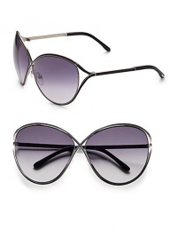 THE LOOKRound crisscross style Metal framesFloating lens temples Logo accented ear pieces UVA and UVB protectionSignature case includedORIGINMade in Italy THE LOOKRound crisscross style Metal framesFloating lens temples Logo accented ear pieces UVA and UVB protectionSignature case includedORIGINMade in Italy