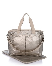 An utterly chic baby bag from LeSportsac, crafted of durable shimmery nylon. Includes a changing pad and an interior stroller strap with dogclip closures. An utterly chic baby bag from LeSportsac, crafted of durable shimmery nylon. Includes a changing pad and an interior stroller strap with dogclip closures.