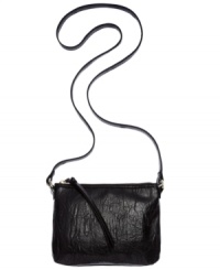 Play up your chic side with this petite design from BCBGeneration that's big on style. Fab faux leather and signature hardware add some urban cool, while the slender crossbody strap offers instant versatility. Play up your chic side with this petite design from BCBGeneration that's big on style. Fab faux leather and signature hardware add some urban cool, while the slender crossbody strap offers instant versatility.