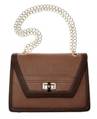 A classic, tailored satchel is ideal for elegant evenings out or afternoons around town. This Danielle Nicole Olivia features ladylike chain-link straps, silver-tone turnlock and detail stitching, while three separate pockets organize the interior. A classic, tailored satchel is ideal for elegant evenings out or afternoons around town. This Danielle Nicole Olivia features ladylike chain-link straps, silver-tone turnlock and detail stitching, while three separate pockets organize the interior.