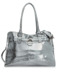 Add a little bling to your everyday ensemble and look like the rock-star you really are. Crafted in metallic, cobra-embossed leather with a signature silver-tone lock, this take-anywhere tote by Calvin Klein is definitely dressed to impress. Add a little bling to your everyday ensemble and look like the rock-star you really are. Crafted in metallic, cobra-embossed leather with a signature silver-tone lock, this take-anywhere tote by Calvin Klein is definitely dressed to impress.