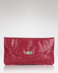 Sized-right for the day-to-night switch-up, this Sorial clutch works an exotic vibe in textured embossed leather, finished with an understated turn-lock. Sized-right for the day-to-night switch-up, this Sorial clutch works an exotic vibe in textured embossed leather, finished with an understated turn-lock.