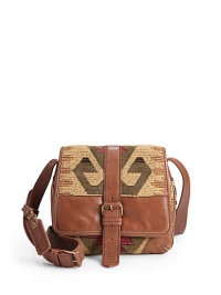 THE LOOKAdjustable crossbody strapMagnetic flap closure with decorative buckleThree-gusset designTapestry fabric construction with leather trimLogo-embossed leather luggage tagThree open compartmentsOne inside open pocketOne inside zip pocketInside logo detailTHE MEASUREMENTAdjustable crossbody strap, 18-23 drop8W X 9H X 3DTHE MATERIALTapestry fabricLeather trimLogo printed liningORIGINImported THE LOOKAdjustable crossbody strapMagnetic flap closure with decorative buckleThree-gusset designTapestry fabric construction with leather trimLogo-embossed leather luggage tagThree open compartmentsOne inside open pocketOne inside zip pocketInside logo detailTHE MEASUREMENTAdjustable crossbody strap, 18-23 drop8W X 9H X 3DTHE MATERIALTapestry fabricLeather trimLogo printed liningORIGINImported