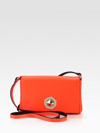 A slim and sleek style with radiant hardware and a long crossbody strap.Shoulder strap, 21½ dropTurnlock flap closureOne inside open pocketCotton lining7½W X 4½H X 1DImported A slim and sleek style with radiant hardware and a long crossbody strap.Shoulder strap, 21½ dropTurnlock flap closureOne inside open pocketCotton lining7½W X 4½H X 1DImported