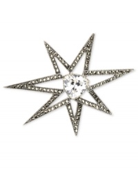 Burst onto the scene. Judith Jack's star brooch is crafted from sterling silver with a marcasite (1-1/4 ct. t.w.) border and stunning cubic zirconia (10-1/2 ct. t.w.) center, that makes it perfect for lighting up the night. Approximate length: 2-7/10 inches. Burst onto the scene. Judith Jack's star brooch is crafted from sterling silver with a marcasite (1-1/4 ct. t.w.) border and stunning cubic zirconia (10-1/2 ct. t.w.) center, that makes it perfect for lighting up the night. Approximate length: 2-7/10 inches.
