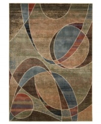 An abstract beauty in bold, blended color. Rich in artful expression, this Nourison rug is made with exclusive, premium-quality Opulon™ yarns to create a densely woven and strikingly luxurious pile that provides years of fade-free style. Hand-carved details add textural interest. An abstract beauty in bold, blended color. Rich in artful expression, this Nourison rug is made with exclusive, premium-quality Opulon™ yarns to create a densely woven and strikingly luxurious pile that provides years of fade-free style. Hand-carved details add textural interest.