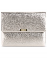 For the tech-savvy women on the go, this posh tablet case featuring Cole Haan's soft pebble leather is a fashion essential. Discrete signature hardware adds a touch of discerning detail, while an intuitively organized interior keeps everything in place. For the tech-savvy women on the go, this posh tablet case featuring Cole Haan's soft pebble leather is a fashion essential. Discrete signature hardware adds a touch of discerning detail, while an intuitively organized interior keeps everything in place.