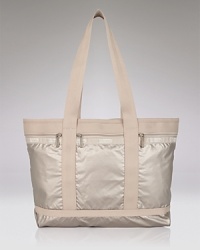 Carry your weekend essentials in style with this durable nylon travel tote from LeSportsac. Carry your weekend essentials in style with this durable nylon travel tote from LeSportsac.